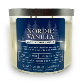 The Candle: Nordic Vanilla – Vanilla Conde Candle is a 14oz, 3-wick vanilla-scented candle in a glass jar with a blue label detailing its scent, burn time, eco-friendly wax, and brand—ideal for cozy spaces.