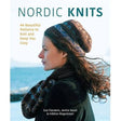 A woman in a matching knit hat and scarf stands outdoors by the water. The cover reads: “Book: Nordic Knits 44 Beautiful Patterns to Knit and Keep You Cozy by Sue Flanders, Janine Kosel & Helene Magnusson.”.