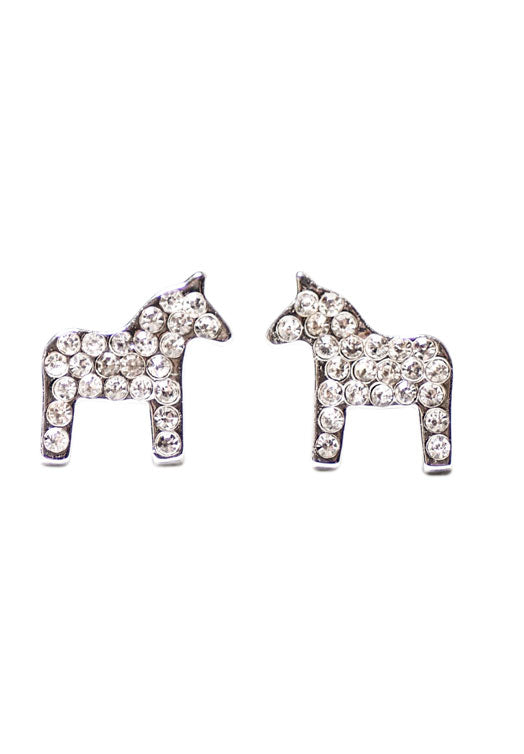 The Dala Horse Crystal Silver Brilliant Stud Earrings by Anna Viktoria are adorned with round, clear gemstones, embodying the charm and Scandinavian grace of Dala horses.