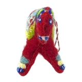 Felted wool Scandinavian animal ornament with four legs, decorated with red, blue, green, and yellow accents on a white background.