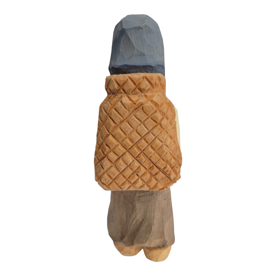 This exquisitely crafted piece, "Katrina" by Bill Erickson, is a small hand-painted wooden figurine intricately carved and featuring a detailed cloak from the back view.