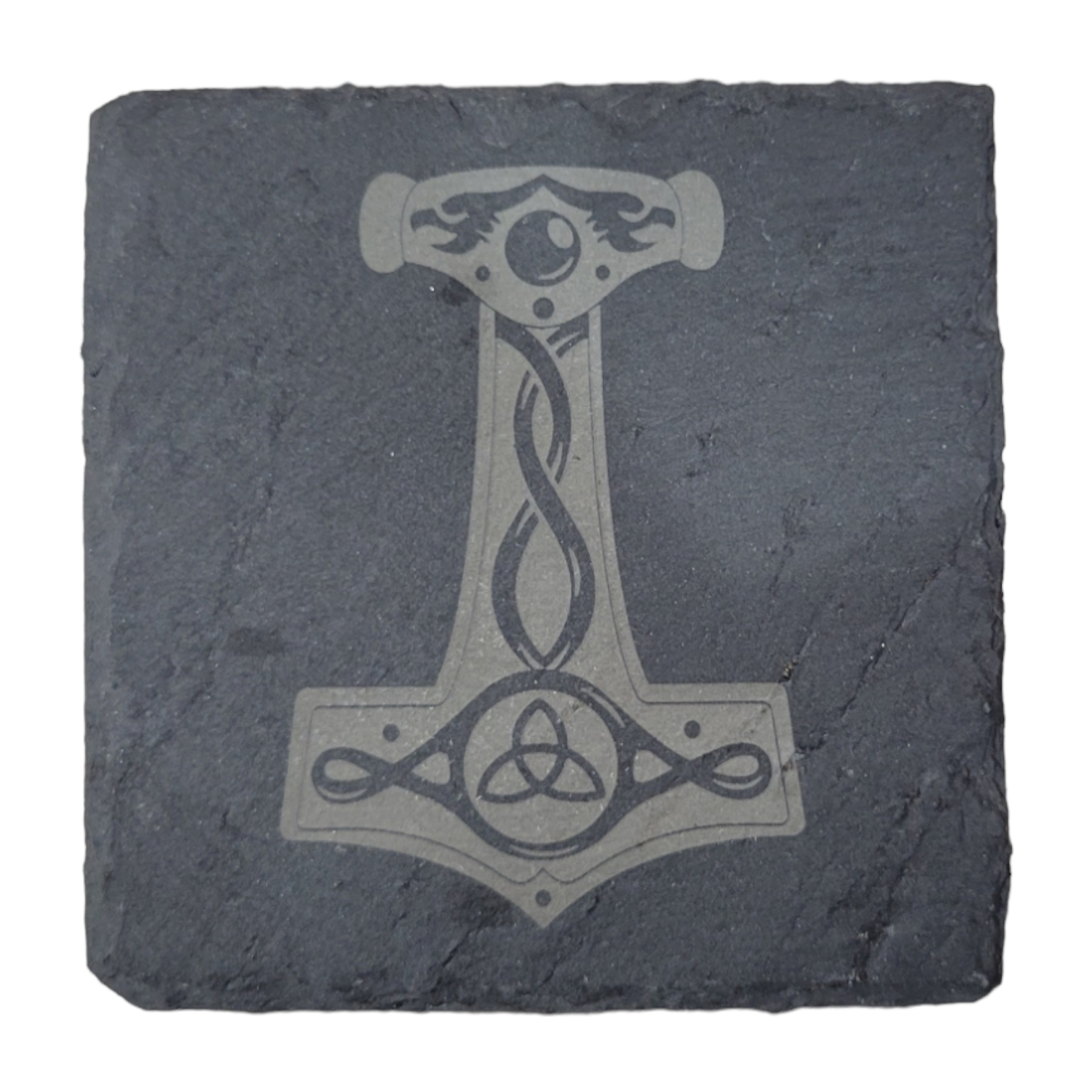 A stone carving of a stylized Thor's Hammer, adorned with an intricately designed triquetra symbol at the base, evokes images of Viking history. It pairs perfectly with the Viking Slate Coaster for a unique and authentic Norse aesthetic.