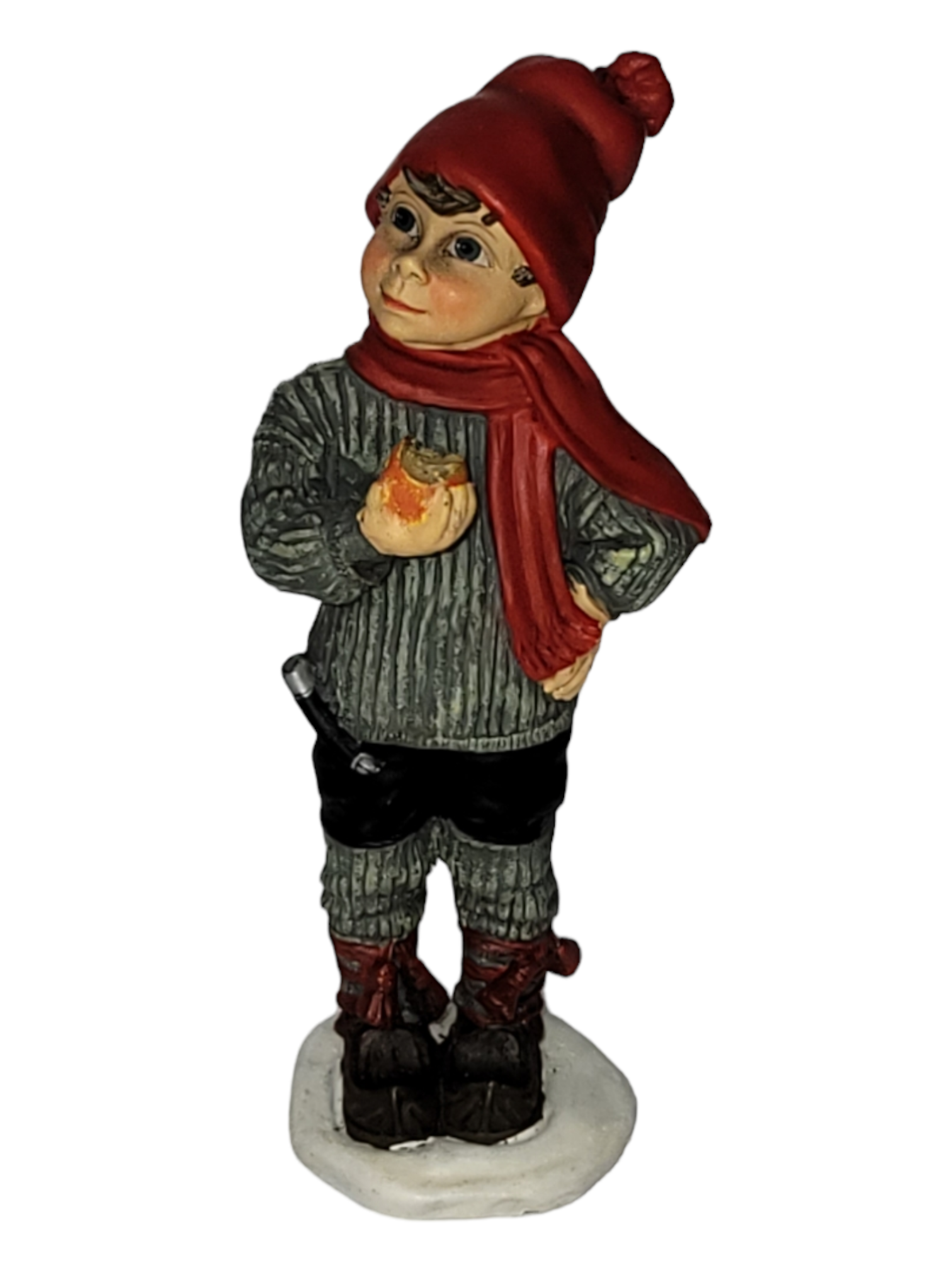 The "Figurine: Apple Boy Large" combines Norwegian design elements and depicts a child in a red hat and scarf, holding an apple while standing on a white base.