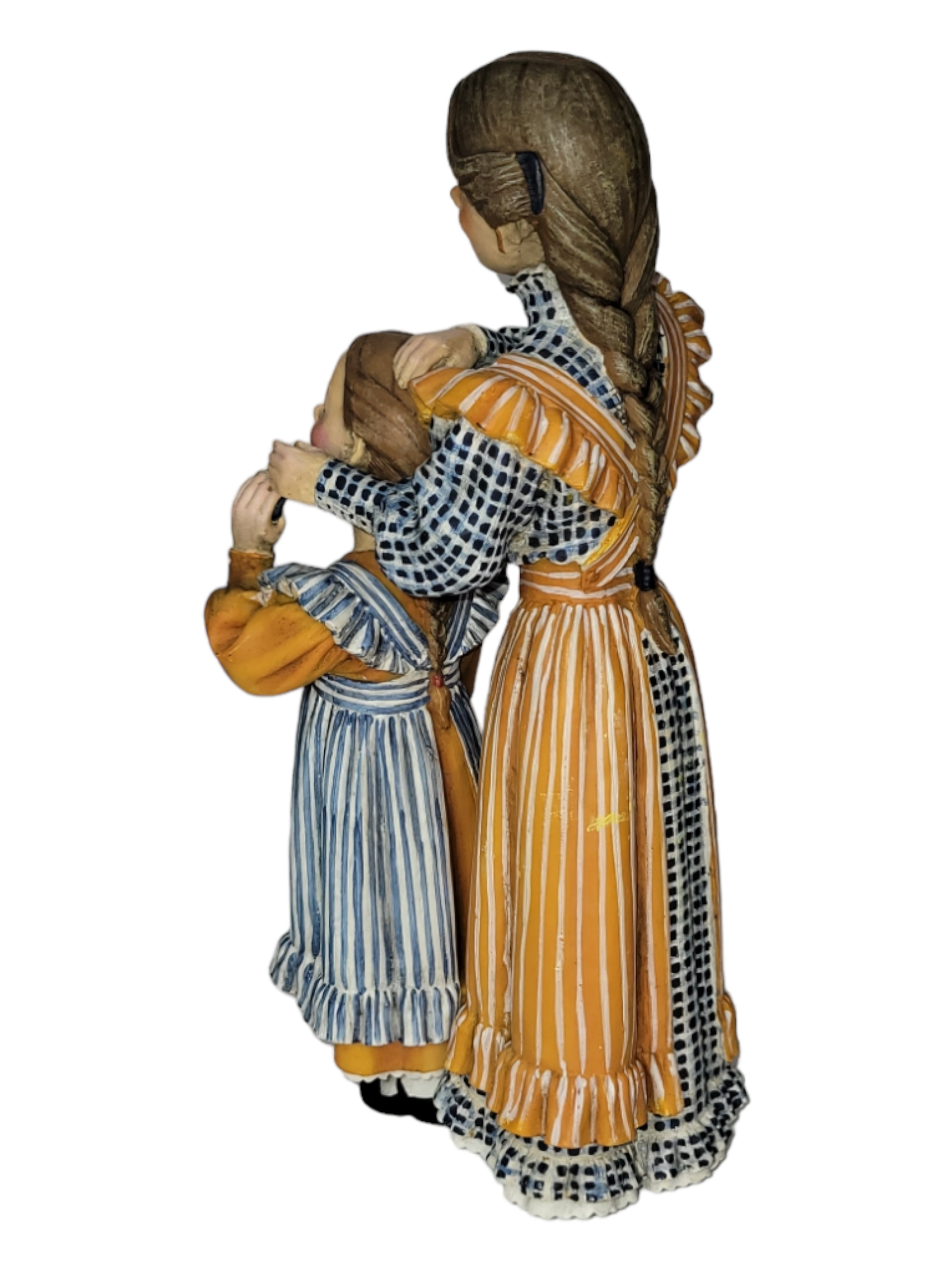 Two ceramic figures, titled "Figurine: Mother & Daughter," depict a woman and child in striped clothing as seen from behind. The woman, evoking the style of a Carl Larsson painting, has a long braid and is gently touching the child's hair.