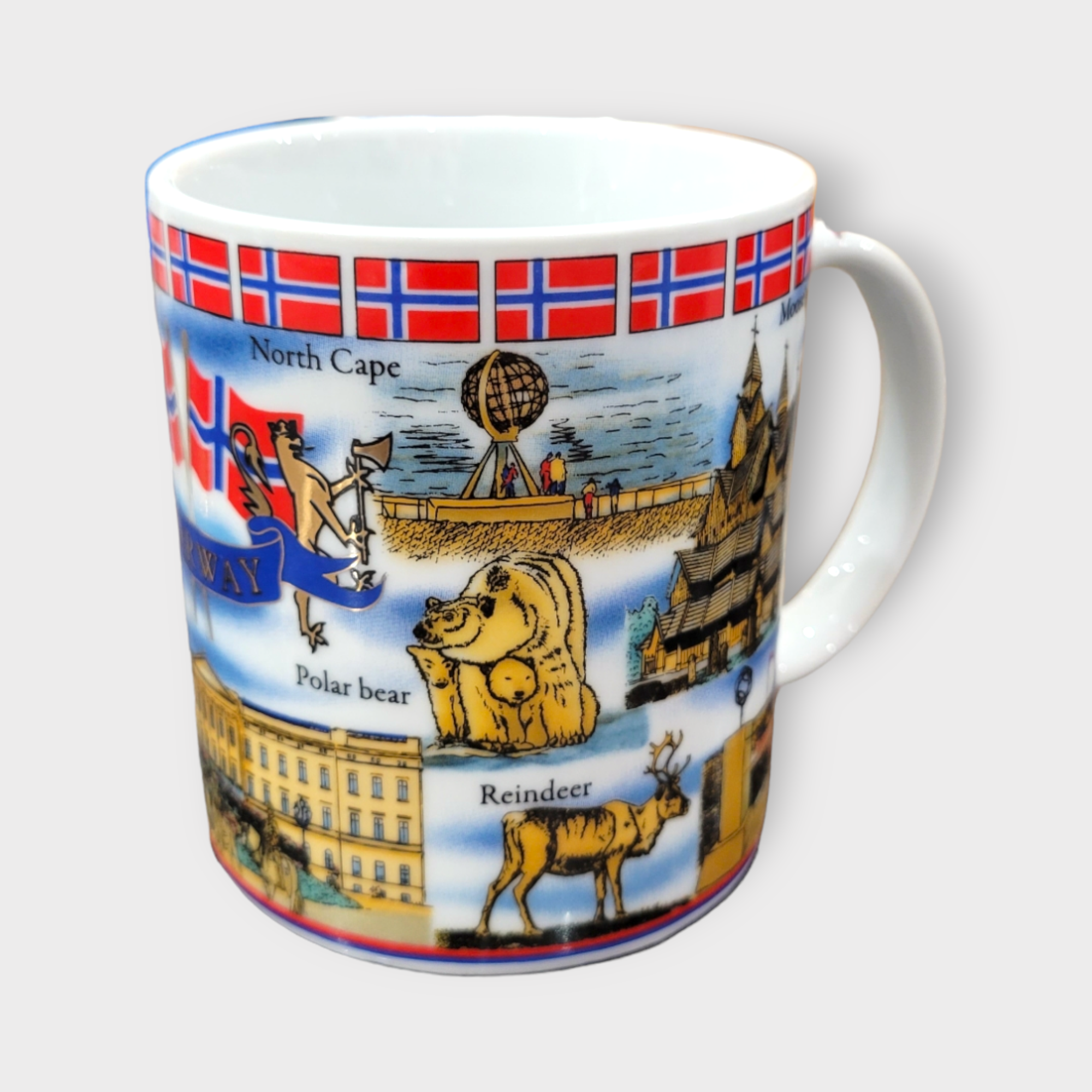 An 11oz ceramic mug from the "Norway" Scenery & Symbols collection, featuring a lively design of Norway's iconic symbols and landmarks, complete with polar bears, reindeer, and Norwegian flags edging the rim.