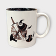 The Coffee Mug: Viking Coat of Arms (11oz) is a white ceramic mug with a brown and black illustrated Viking helmet, sword, and shield design. Dishwasher safe.