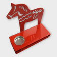 The Candle Holder: Red Dala Horse, Metal Tea Light Candle Holder is a delightful piece with a round candle slot on a rectangular base, offering Scandinavian charm and Swedish décor to enhance any space.