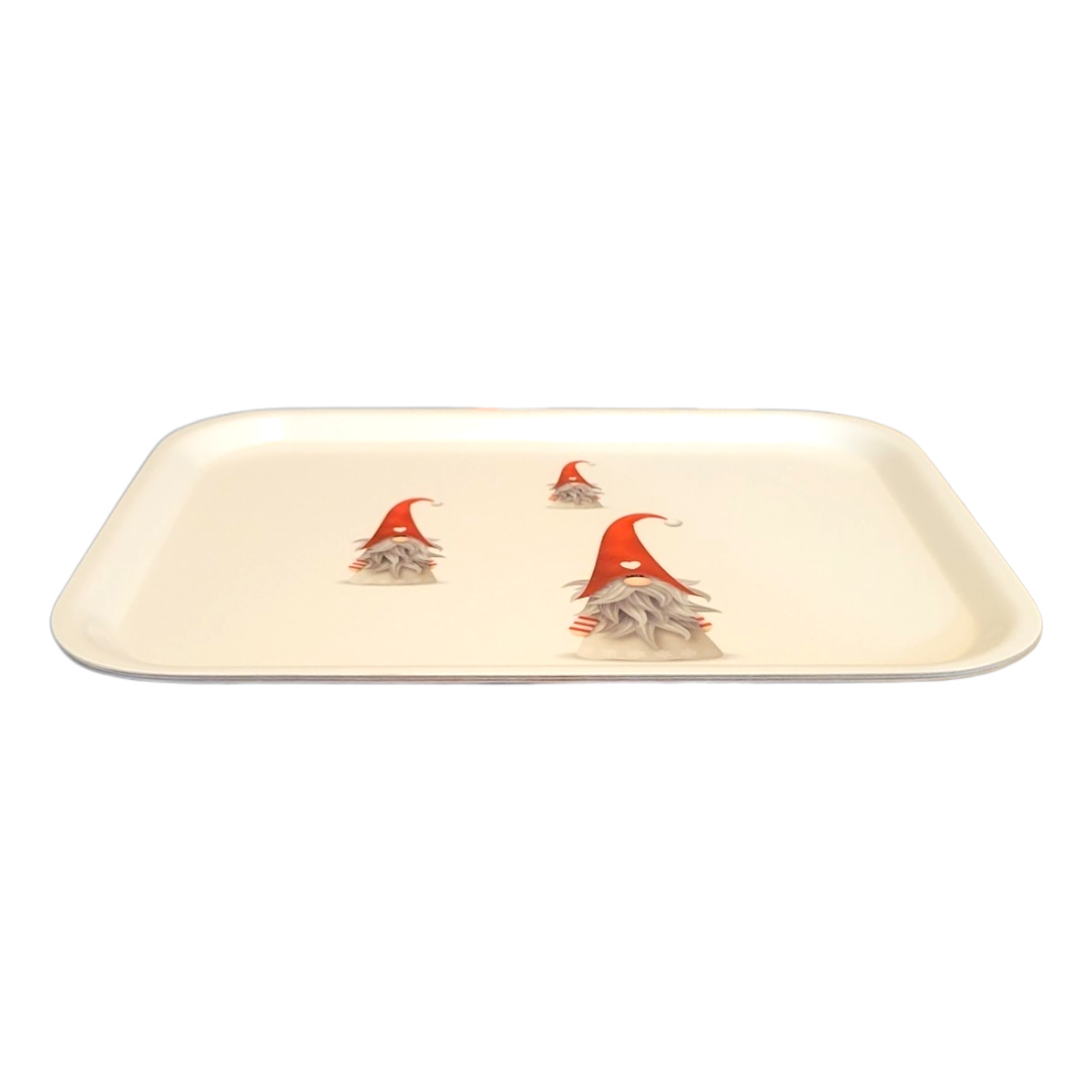 Tray named "Julvattar" measuring 27x20cm, designed with a white background and showcasing three gnome illustrations in red hats.