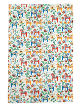 The tea towel features a lively Leksand Mini Swedish Dala Horse pattern with colorful illustrations in red, yellow, blue, and green on white, celebrating Swedish tradition. Available in 4 color options.