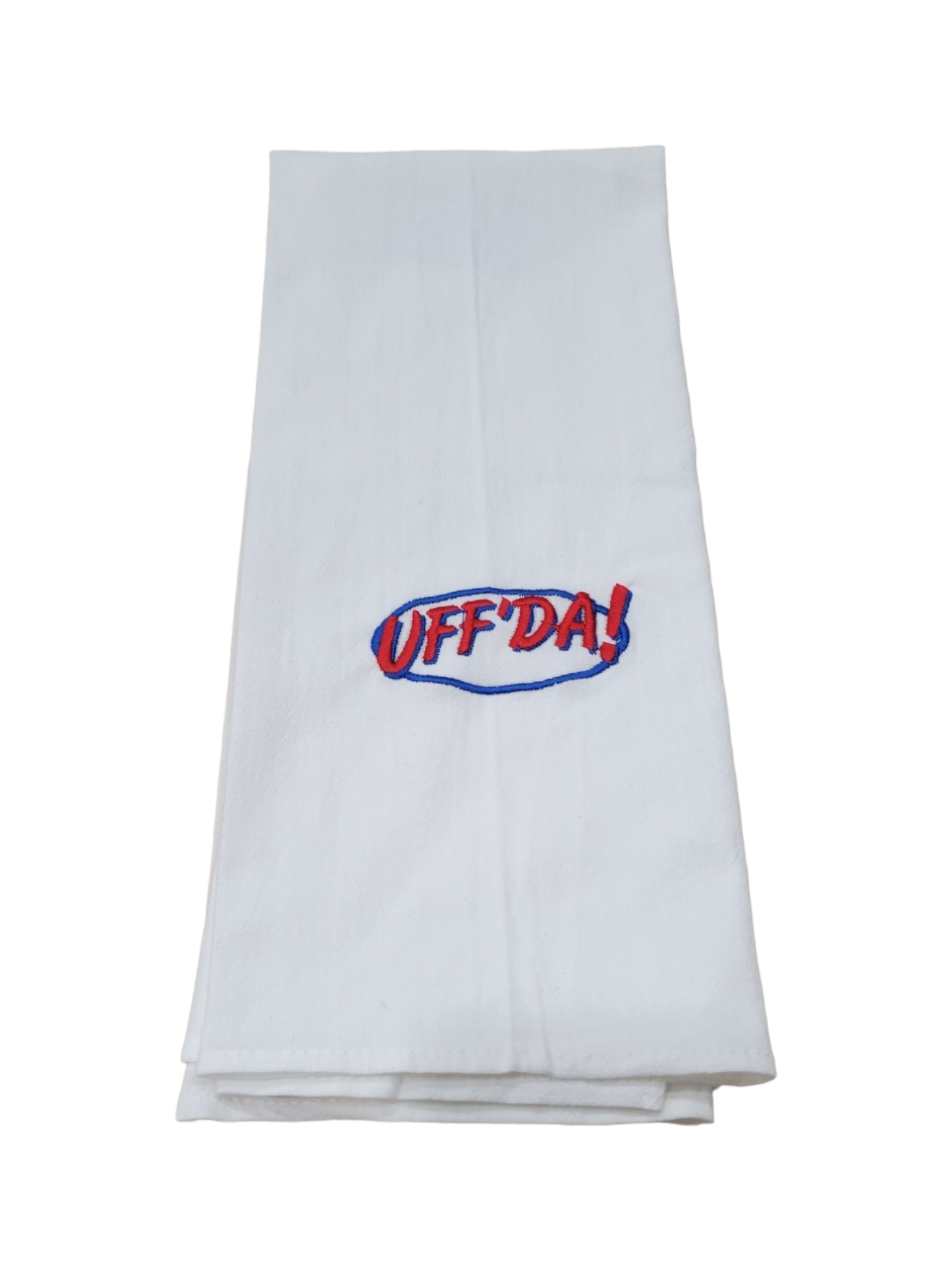 Tea towel featuring "UFFDA!" embroidered in red and blue.