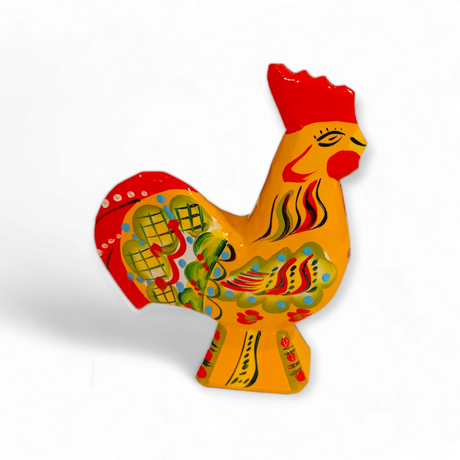 A vibrant yellow ceramic Dala Rooster featuring detailed kurbits patterns on a white background, evoking the essence of traditional Swedish handcraft.