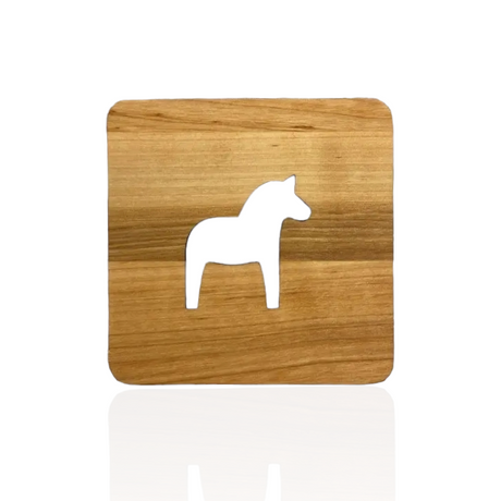 The Coaster: Swedish Dala Horse Laser Cuts Wood Coaster is a handcrafted wooden piece with a Dala Horse silhouette cutout at its center, set against a pristine white background.