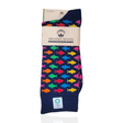 Pair of navy blue cotton socks featuring colorful fish patterns, packaged with a cardboard label that reads “Organic Socks of World.”.