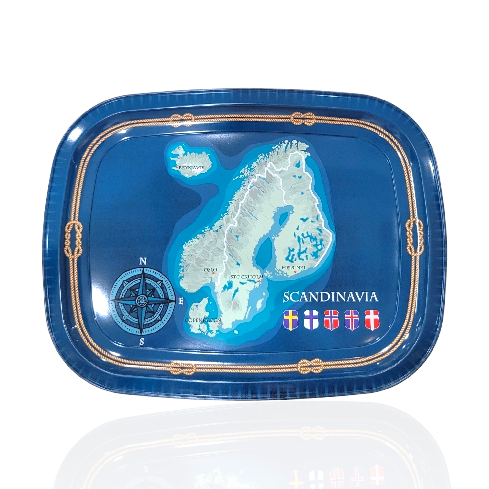 The Tray: Scandinavia 10x12 is a blue tray that features a map of Scandinavia, complete with a compass rose and the flags of Norway, Sweden, Denmark, and Finland.