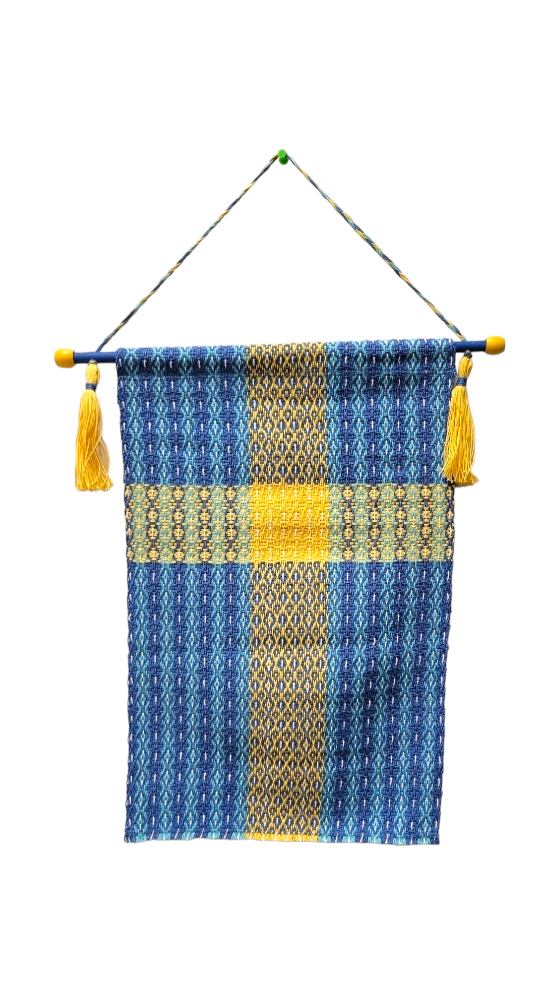 Introducing the "Flag: Flag on Hanger - Sweden," a woven wall hanging that captures the essence of the Swedish flag in its blue and yellow colors. This piece features a geometric pattern crafted from 100% cotton and is elegantly suspended by a rod with tassels at each end, adding a touch of heritage to your space.