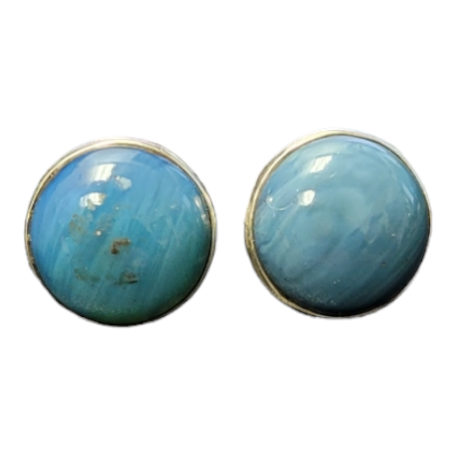 A pair of plain round studs in Swedish Blue stone, elegantly set in sleek metal rims, capturing the essence of exquisite handmade silver jewelry.