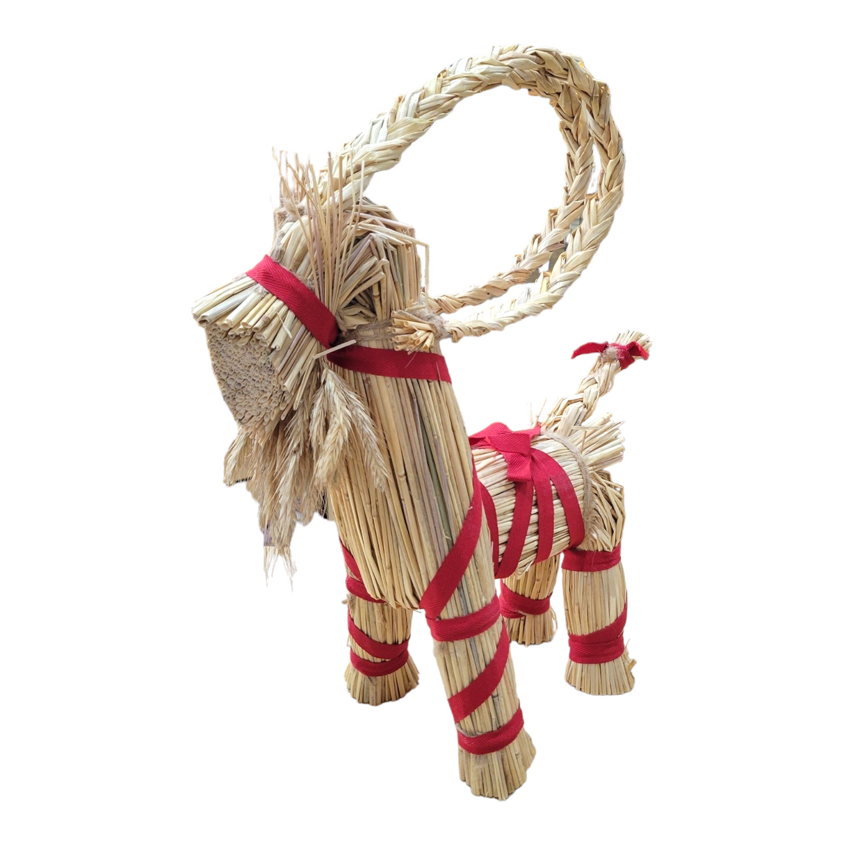 The Decor: Straw Goat Julbok 14 with beard is a classic Scandinavian Christmas ornament crafted from straw, bound with red ribbons, and features four legs, curved horns and tail.