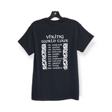 This black tee, made from 100% Gildan Heavy Cotton, showcases the bold "Viking World Tour" design on the front and a list of years and countries in striking white text on the back.
