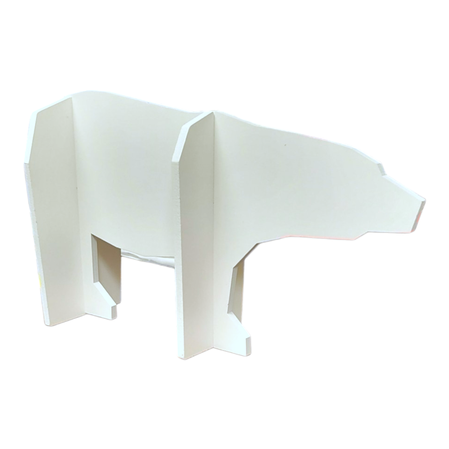 A white, minimalist sculpture of Mama the Polar Bear crafted from interlocking flat panels, inspired by The Polar Bear Wish.