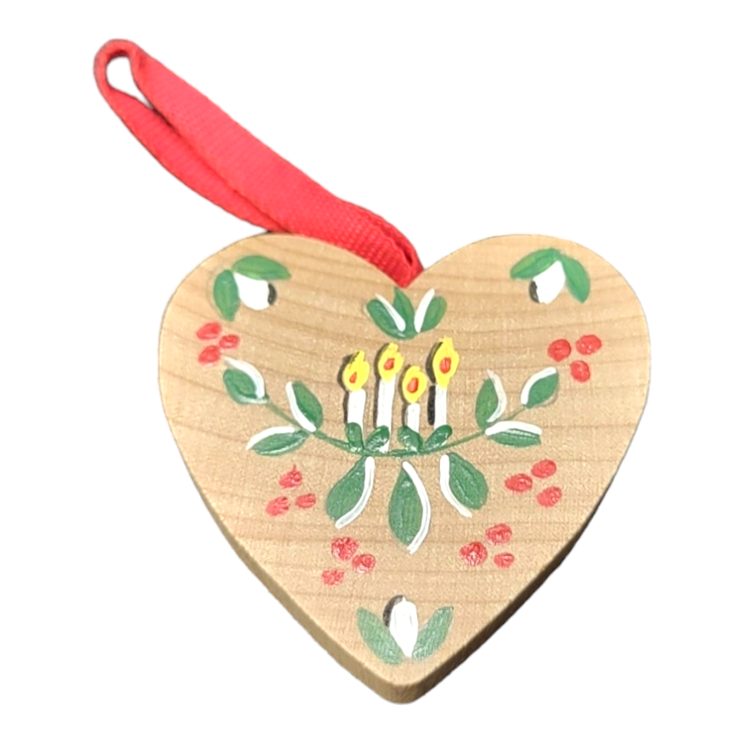 Heart-shaped "Ornament: Heart Christmas Candle Natural" showcasing Christmas candles, decorated with a red ribbon and lively green and red floral patterns on natural wood.