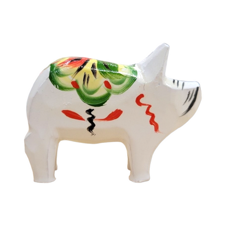 The Dala Pig: White, crafted from ceramic and adorned with vibrant floral patterns reminiscent of traditional Swedish handcraft, brings a touch of charm and authenticity to any space.