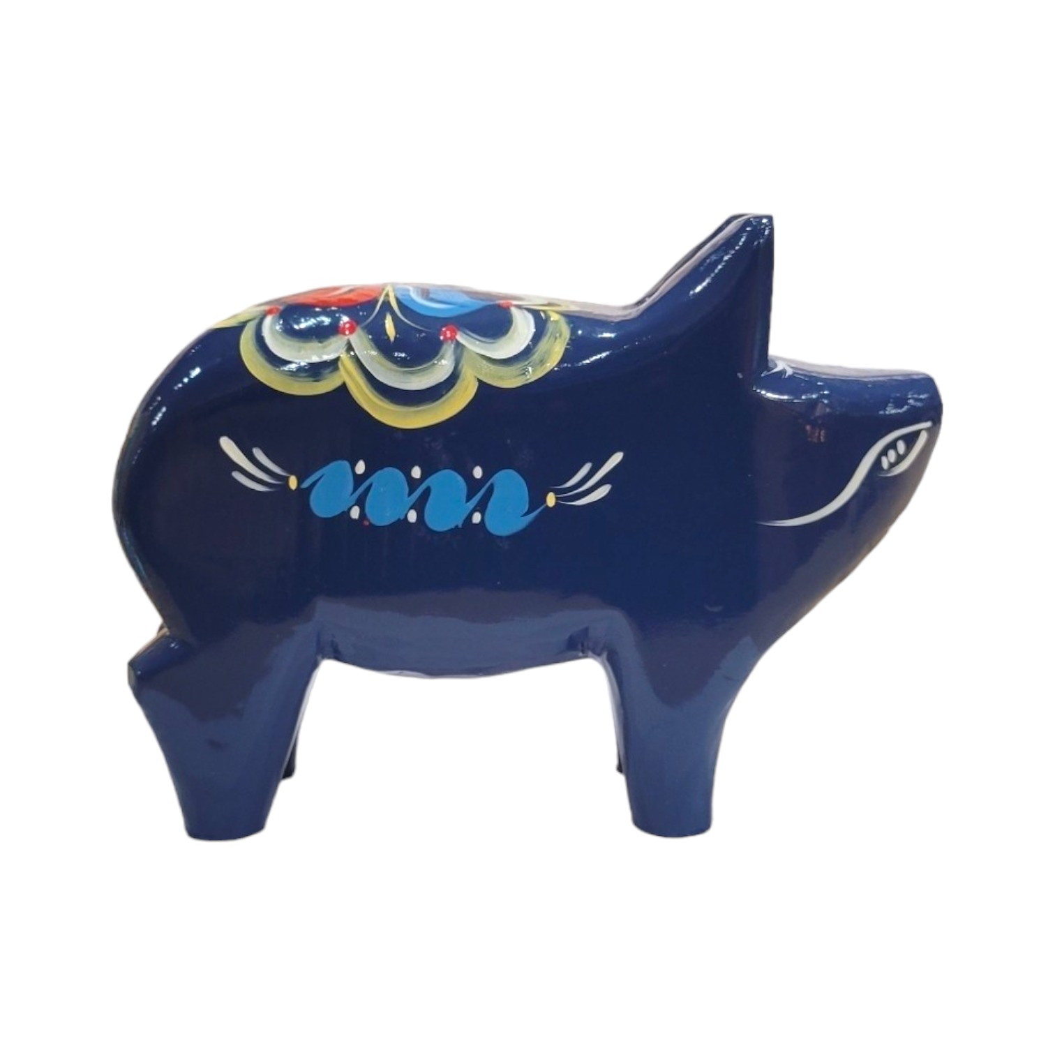 The Dala Pig: Blue is a ceramic piggy bank that showcases colorful decorative patterns influenced by Swedish handcraft, with intricate kurbits designs reminiscent of traditional Dala pigs.