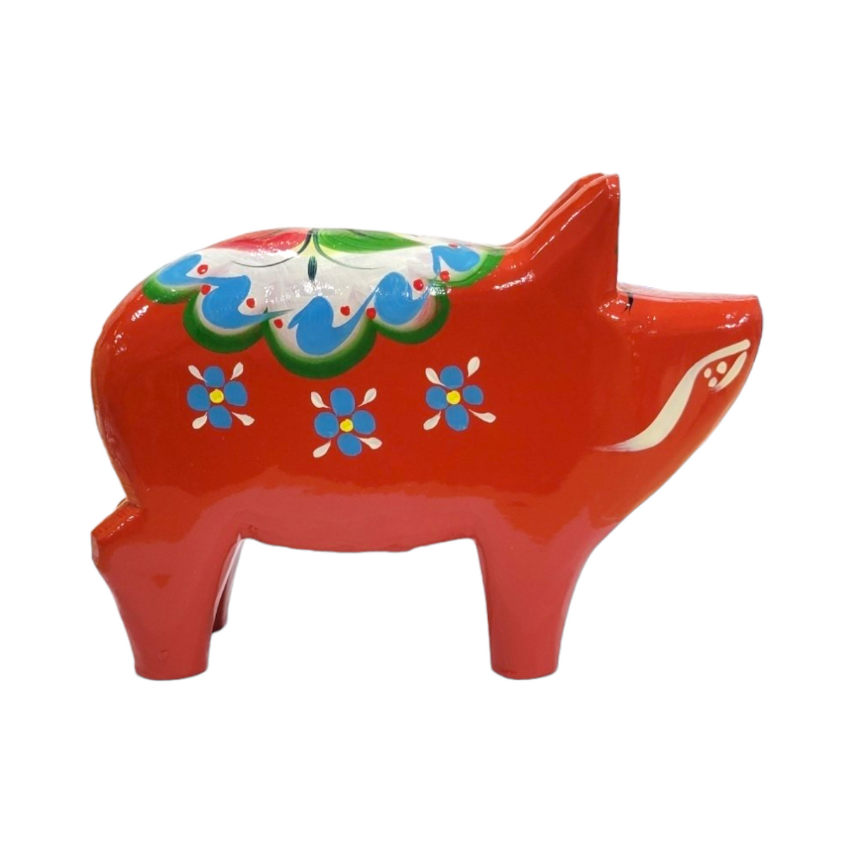 The Dala Pig: Red features a floral design and decorative patterns on its back and face, capturing the charm of Swedish handcraft.
