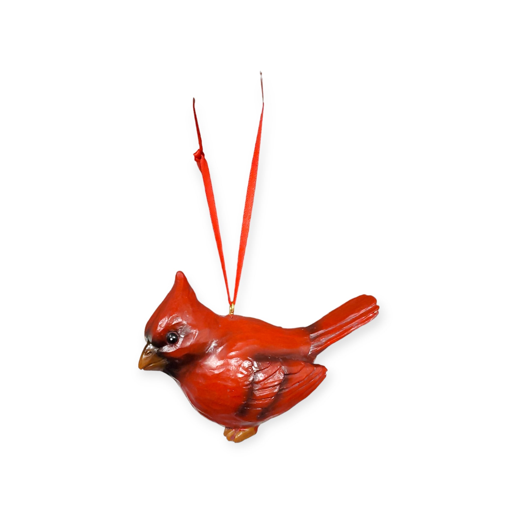 The Ornament: Cardinal, featuring a lifelike red cardinal bird design and a ribbon for easy hanging, is the perfect addition to your Christmas tree.