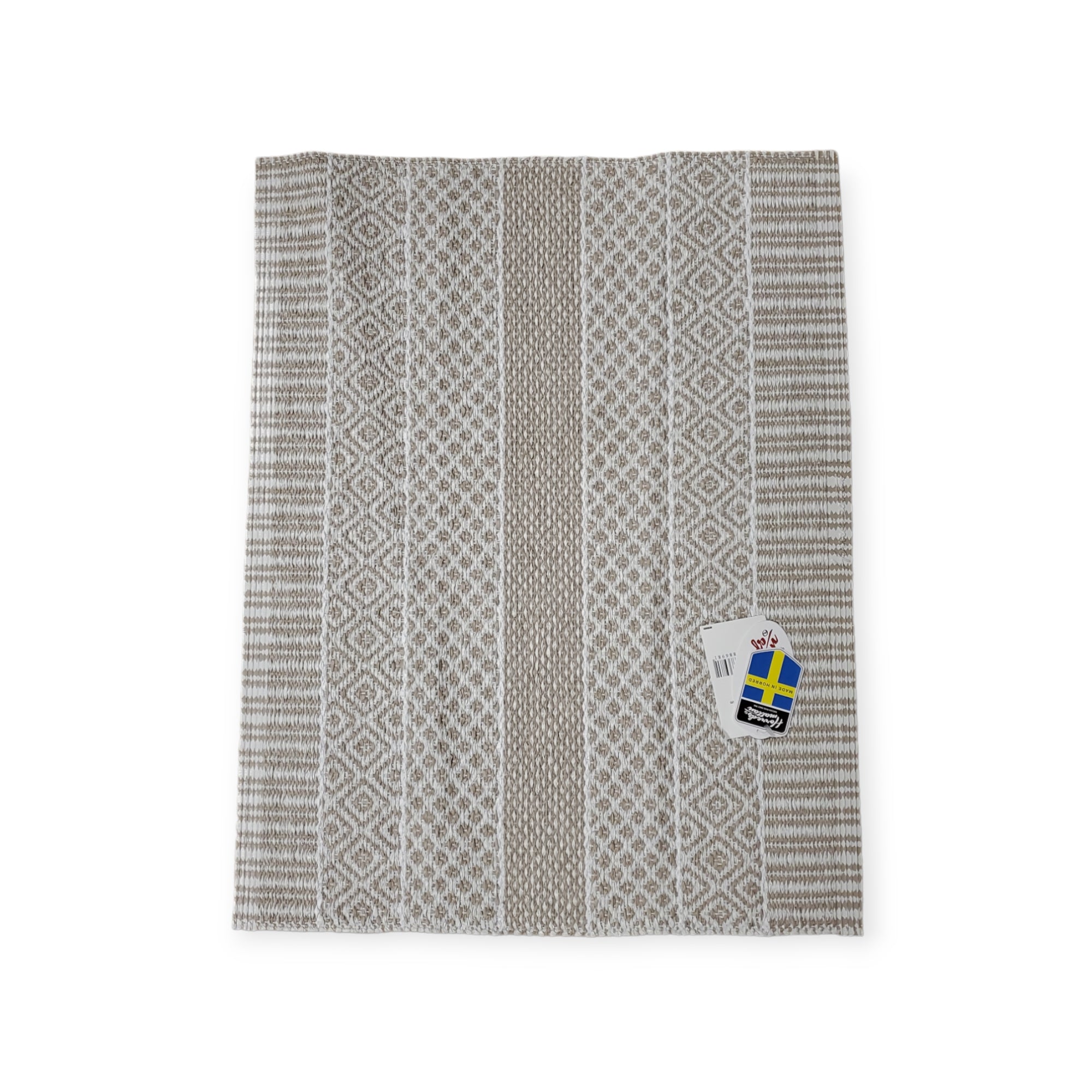 The Alfie Sand rug, characterized by its gray and white stripes and geometric pattern, features a tag with a Swedish flag, embodying the timeless charm of Swedish tradition.