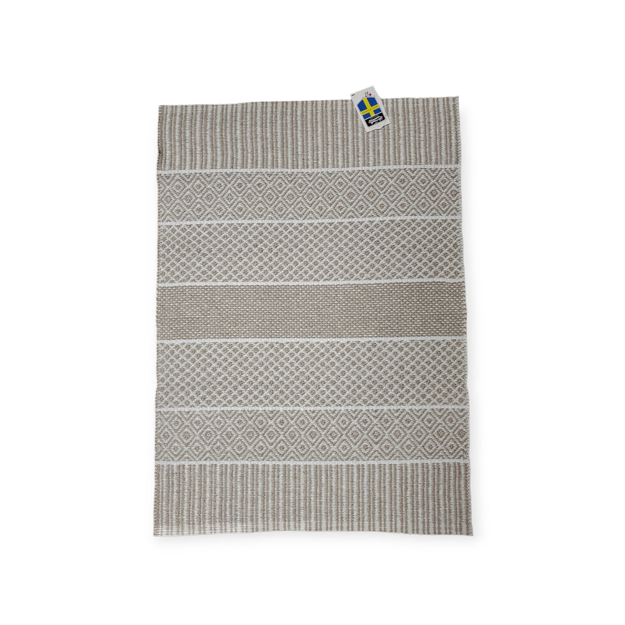 Introducing the Alfie Sand: a rectangular woven rug with a geometric pattern in beige and gray tones, inspired by Horredsmattan's Swedish tradition and featuring a tag in one corner.