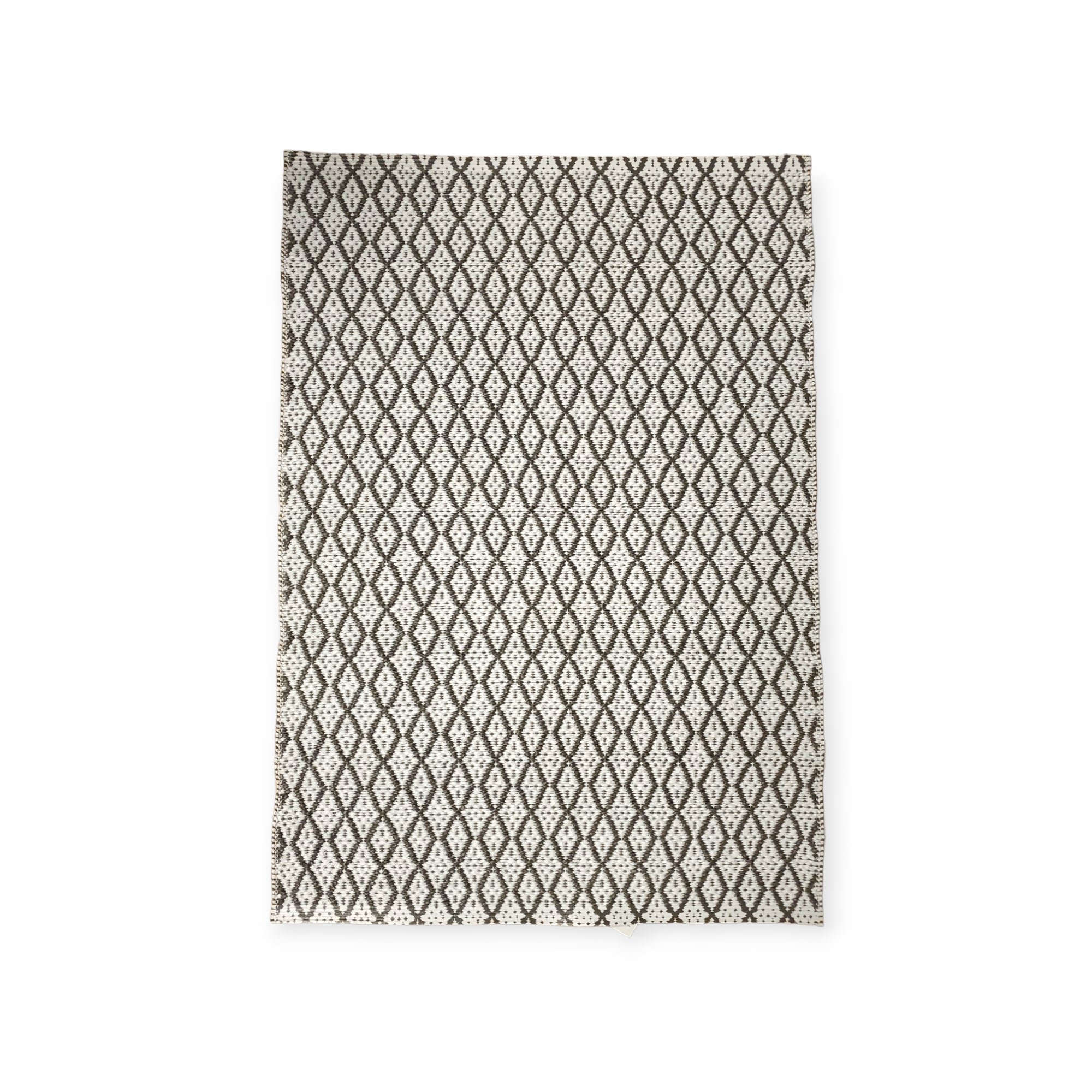 The Eye Grey 70x100cm Swedish Vinyl Rug combines style and function with its black diamond pattern on a white background. This durable, long-lasting rug is also non-skid reversible, ensuring safety and versatility for any room.