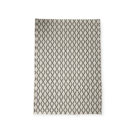 The Eye Grey 70x100cm Swedish Vinyl Rug combines style and function with its black diamond pattern on a white background. This durable, long-lasting rug is also non-skid reversible, ensuring safety and versatility for any room.