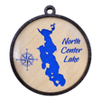 A handcrafted round wooden ornament, etched with a blue map outline of North Center Lake and featuring a compass rose alongside the text "North Center Lake," encapsulates the spirit of adventure and nature in one charming piece.