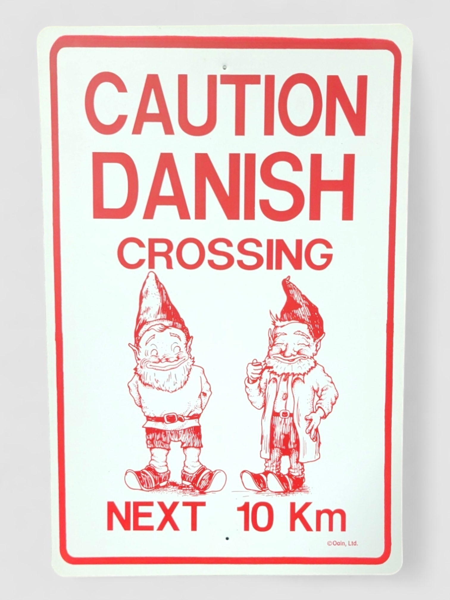 Sign: "Caution Danish Crossing"