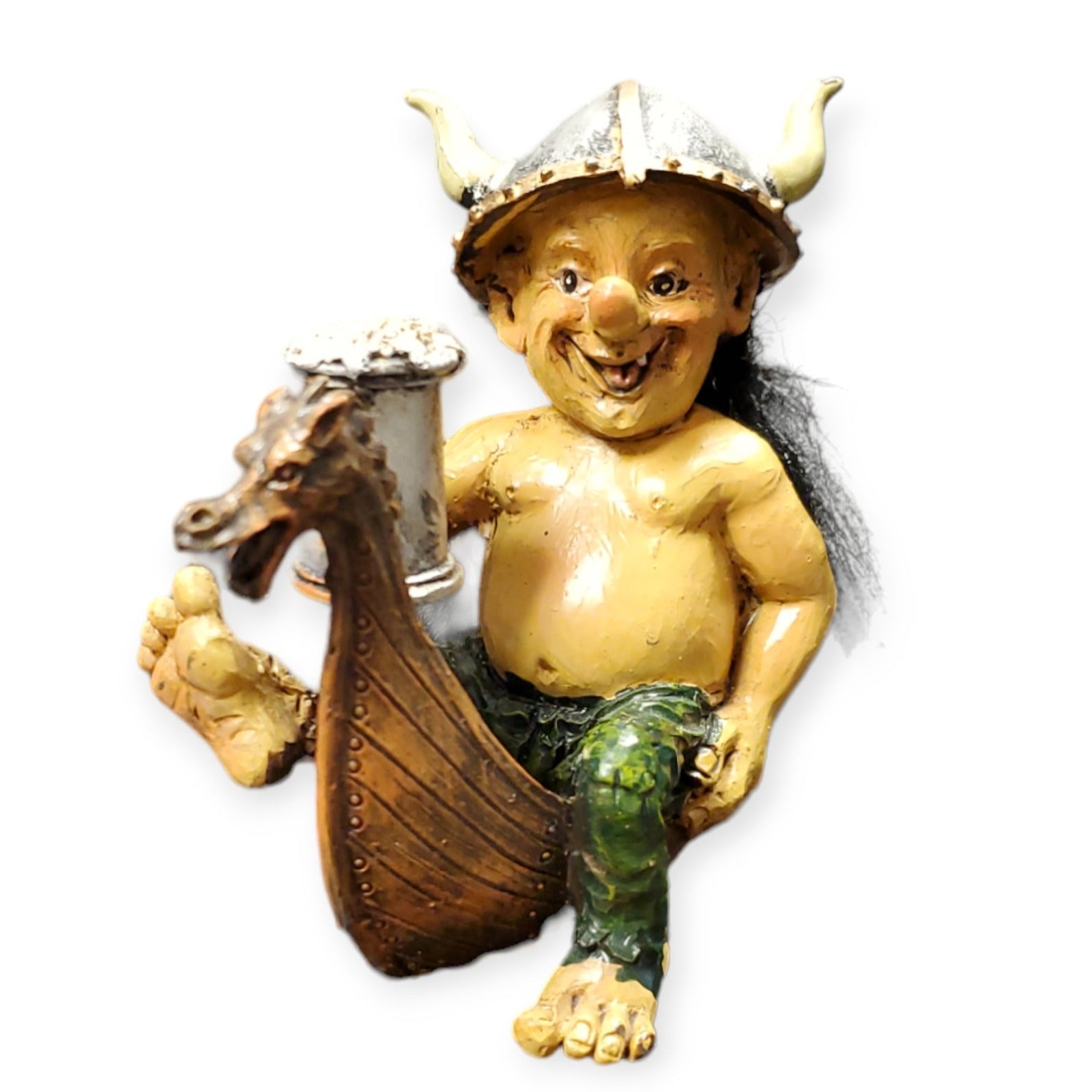 A small resin statue featuring a cheerful troll, part of the "Troll: Viking Troll on Ship" series, wearing a Viking helmet while sitting on the bow of a Viking ship and holding a mug.