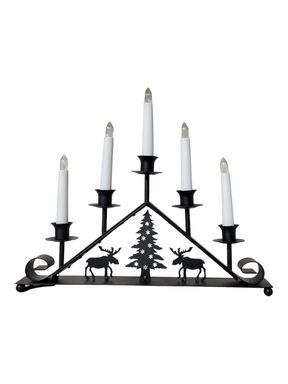 The Black Iron 5 Light Candelabra features pine tree and two moose silhouettes, is battery operated, and adds a cozy Scandinavian touch—perfect welcome lights for any inviting space.