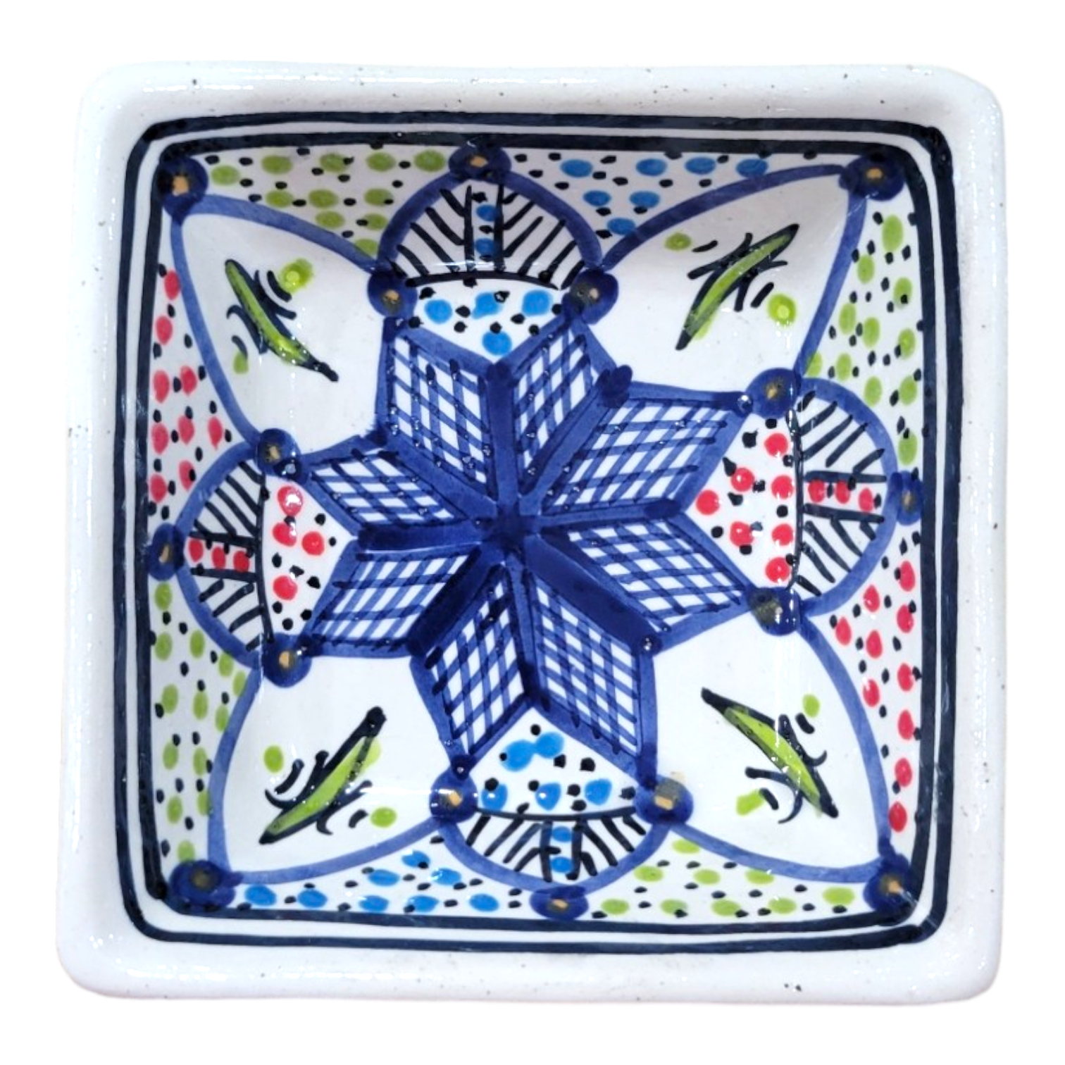 Handcrafted and decorated with geometric and floral designs in vivid blue, green, and red on a white base, the Bowl: Small Square Dipping Bowl Handmade & Hand Painted, Design 5 is a striking piece of art showcasing the elegance typical of handmade earthenware.