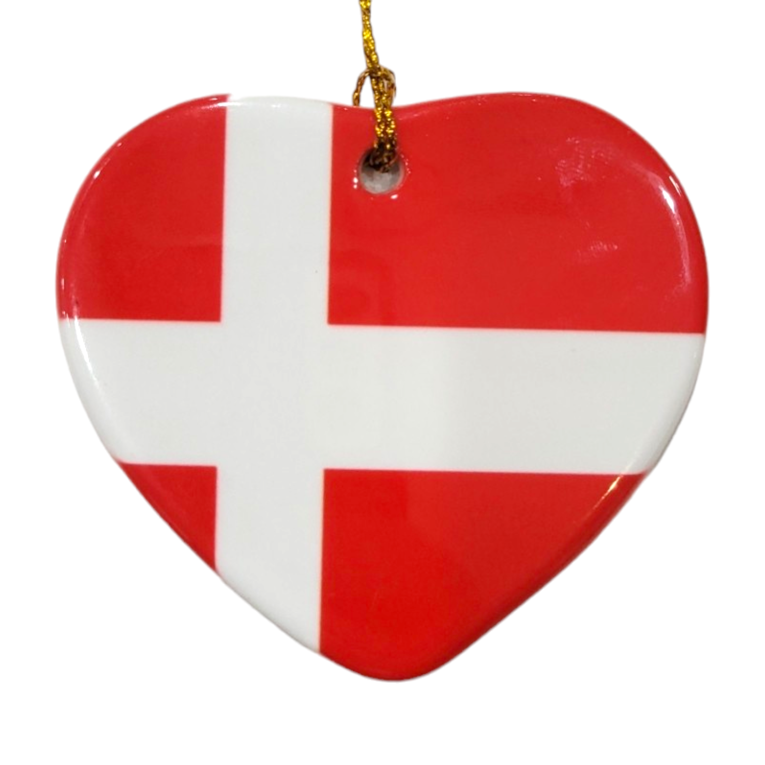 Product: Ornament: 3" Heart Shaped Danish Flag - A charming porcelain ornament in a heart shape, showcasing the Danish flag with a red background and a white cross, suspended by a golden string. This Denmark Flag Ornament measures 3 inches, perfect for adding elegance and national pride to your decor.