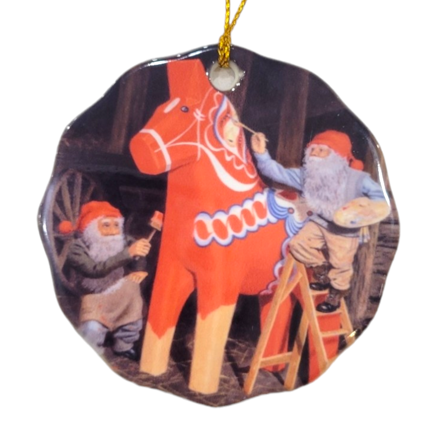 Two gnomes from the Jan Bergerlind Porcelain Painting a Dala Horse ornament set are carefully painting a large red Dala horse figure, with one gnome skillfully balanced on a ladder.