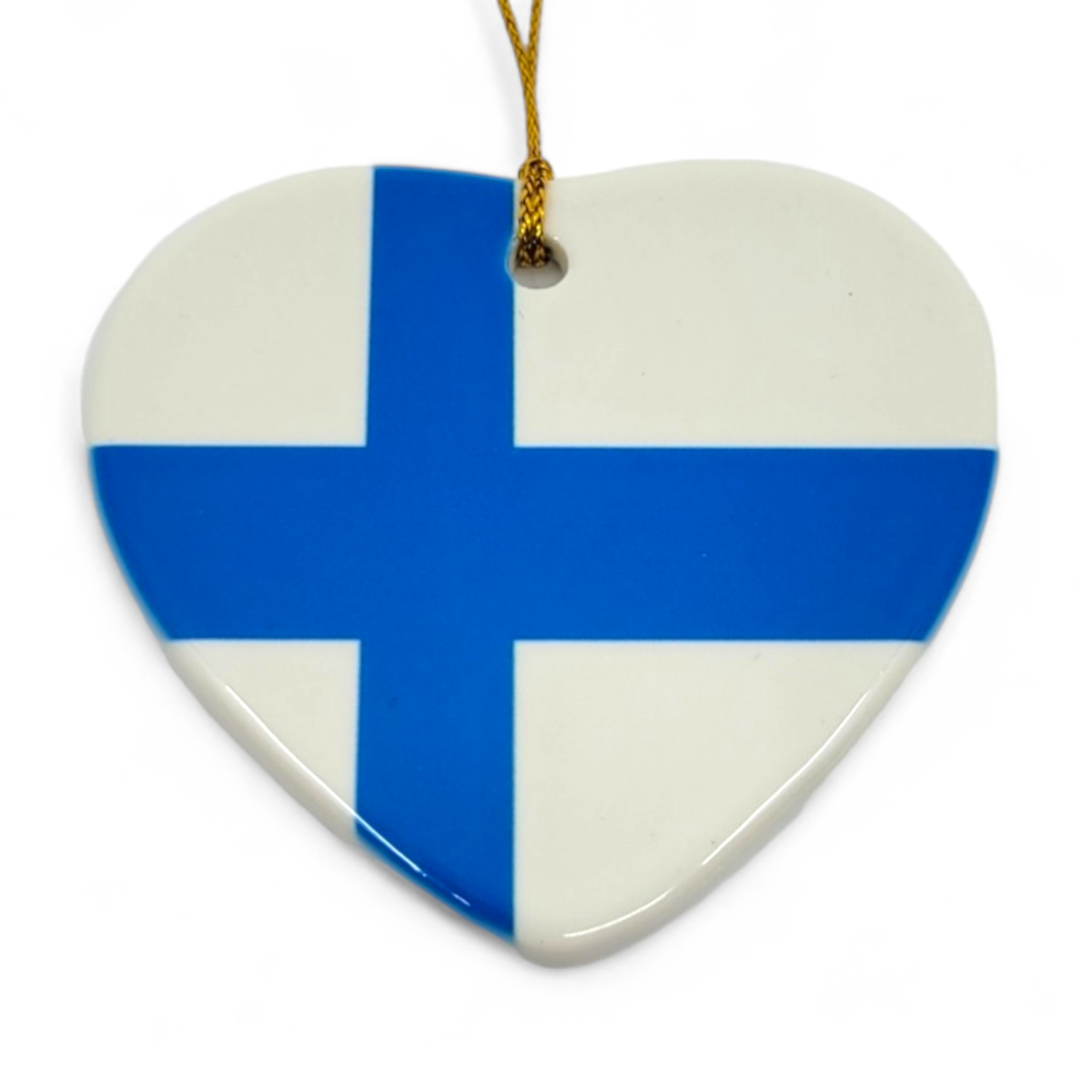 The Ornament: 3" Heart Shaped Finland Flag is a porcelain piece designed in the shape of a heart, featuring the iconic blue Nordic cross on a white background. It comes with a gold string for hanging, making it an ideal choice to add a touch of Finland's charm to your decor.