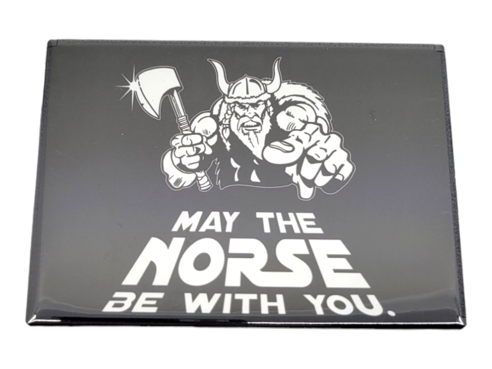 Black magnet depicting a Viking holding an axe and pointing forward, featuring the text "MAY THE NORSE BE WITH YOU." This fade-resistant item is proudly MADE IN USA.