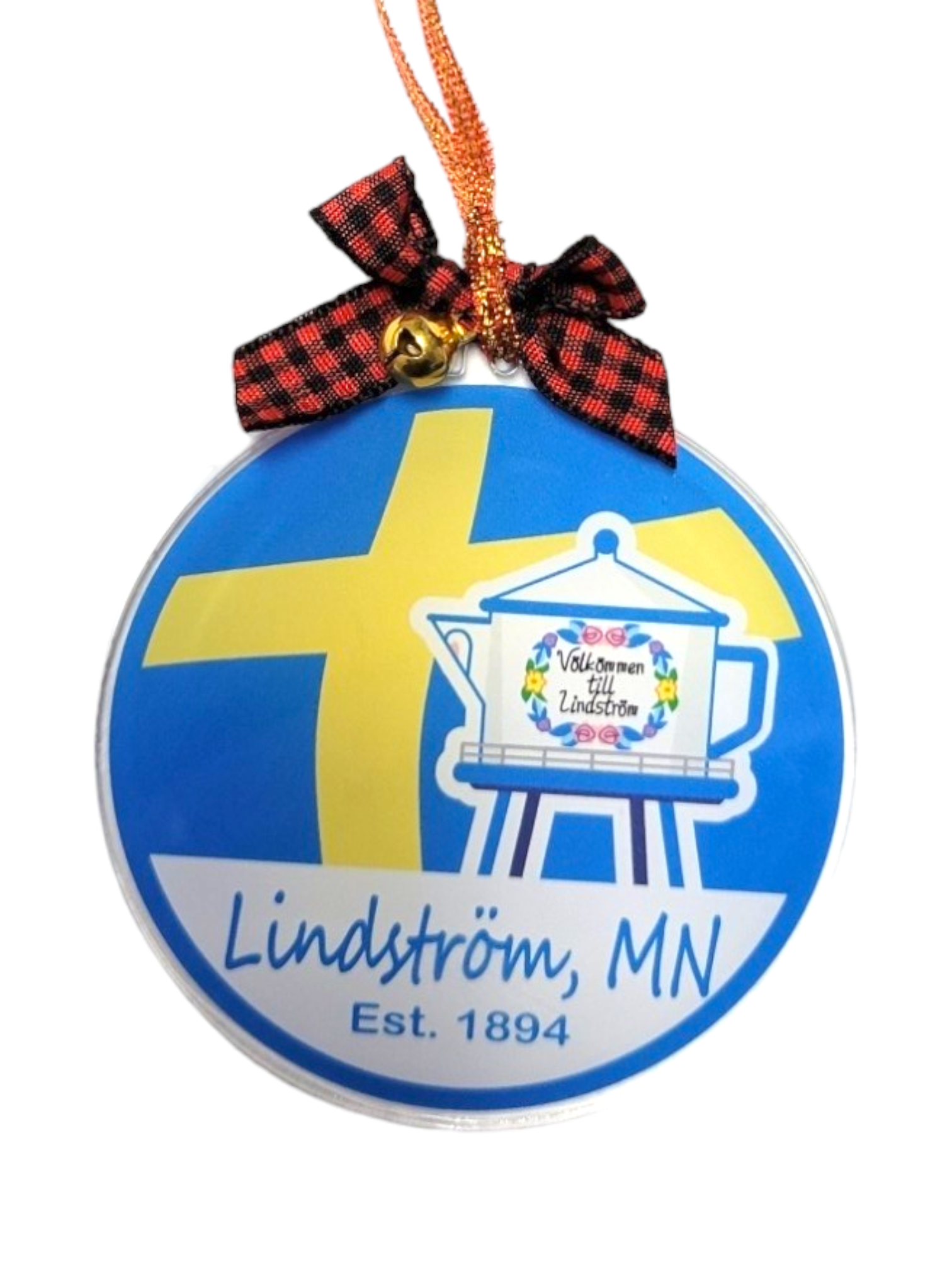 The "Ornament: Lindstrom Est 1894" is an acrylic piece decorated with a delightful Lindström, MN design, featuring a coffee pot motif and a checkered bow that embodies the town's spirit since 1894. The background displays colors inspired by the Swedish cross and measures 3" x 3".