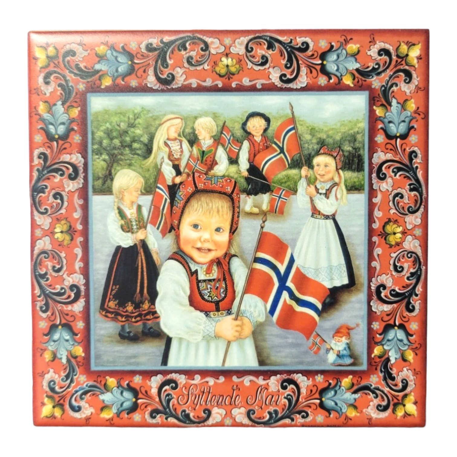 Children in traditional Nordic outfits wave Norwegian flags, encircled by a decorative floral border reminiscent of the intricate patterns on the "Trivet: Syttende Mai 6".