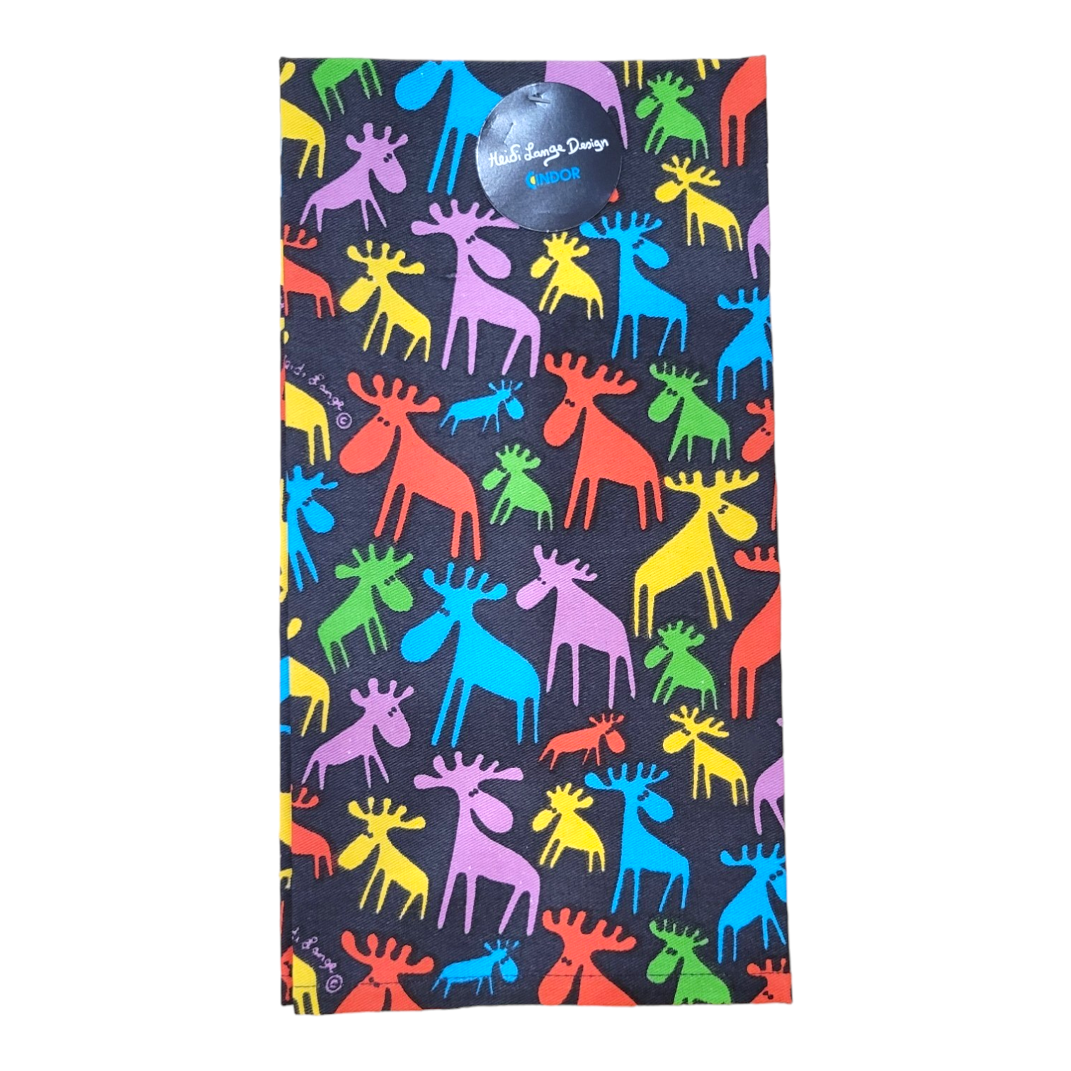 The Tea Towel: Moose Multi features a repeating pattern of colorful moose in red, green, orange, yellow, blue, and purple on a black background, designed by Swedish artist Heidi Lange.