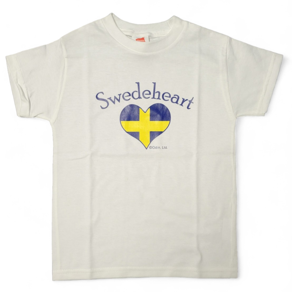 Kids Tee: This white T-shirt, named "Swede Heart," showcases a heart design incorporating the Swedish flag with the word "Swedeheart" above it. Ideal for little ones to express their affection for Sweden!