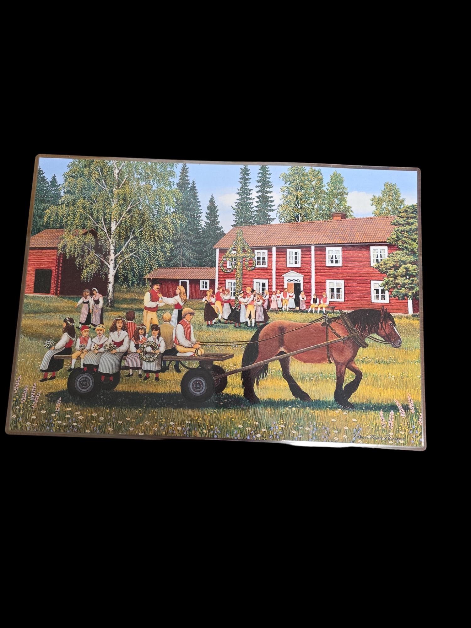 A horse-drawn cart carries people through a charming rural landscape, set against the backdrop of a red house and trees in the evocative Erkers style. This scene, reminiscent of Swedish artistry, unfolds on the "Placemat: Midsommar," where a vibrant group gathers around a maypole.