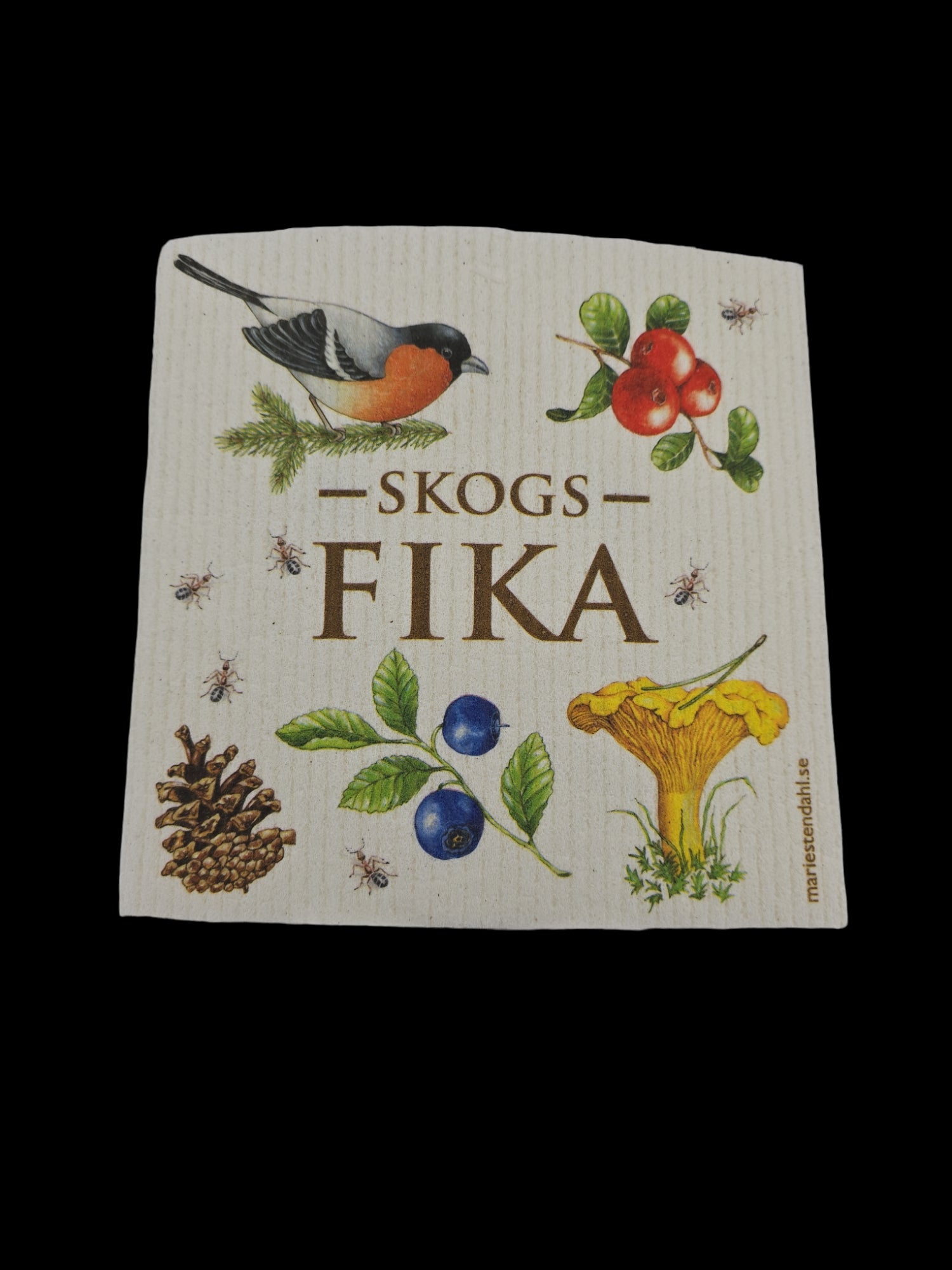 The SKOGS (Forest) FIKA dish cloth is illustrated with a bird, berries, mushrooms, and pine cone on a black background.