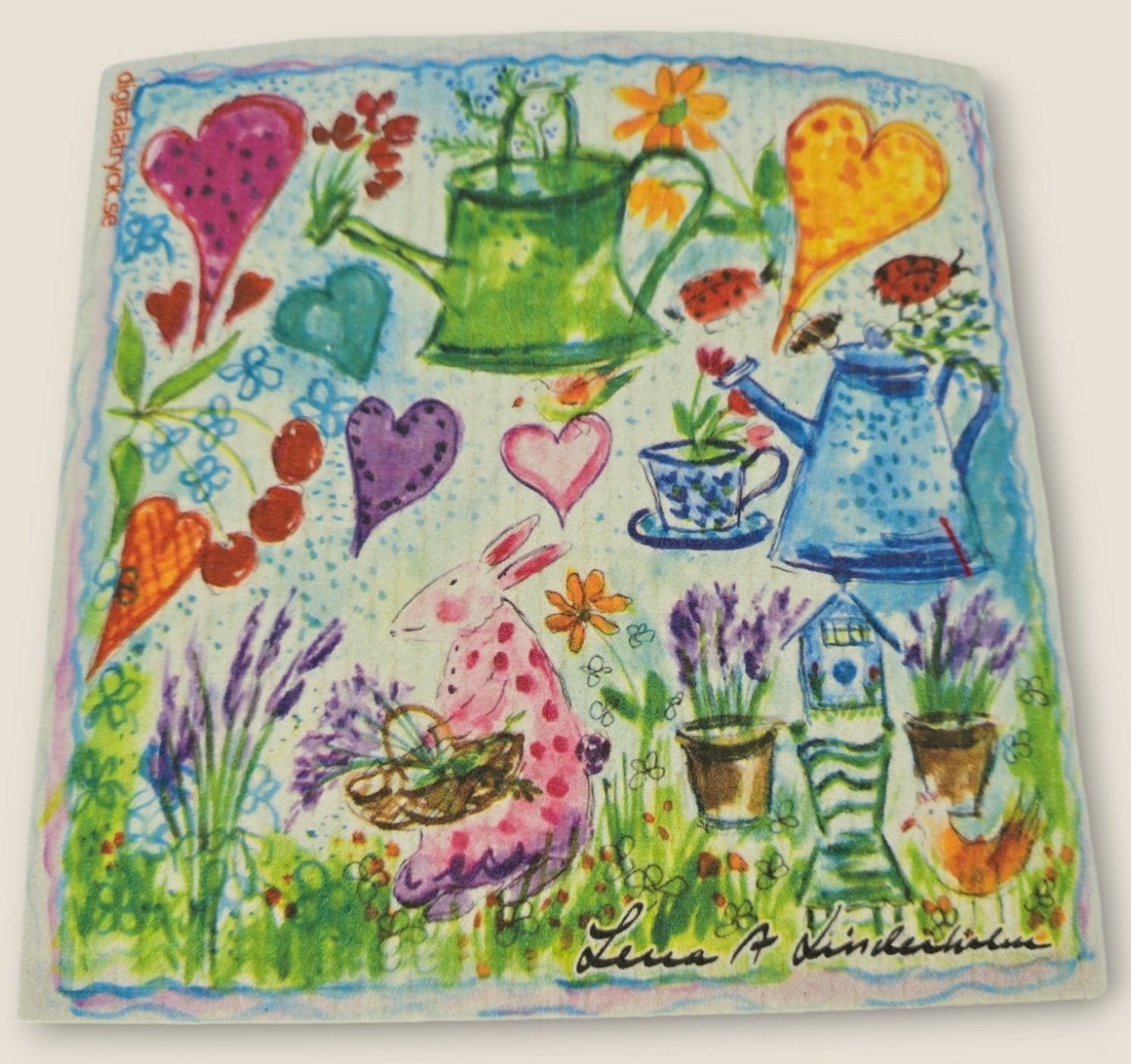 A whimsical garden scene with hearts, watering cans, flowers, and a pink rabbit carrying a basket is adorned by eco-friendly Dish Cloth: Happy Spring from Lena Linderholm, fluttering like leaves in the gentle breeze.