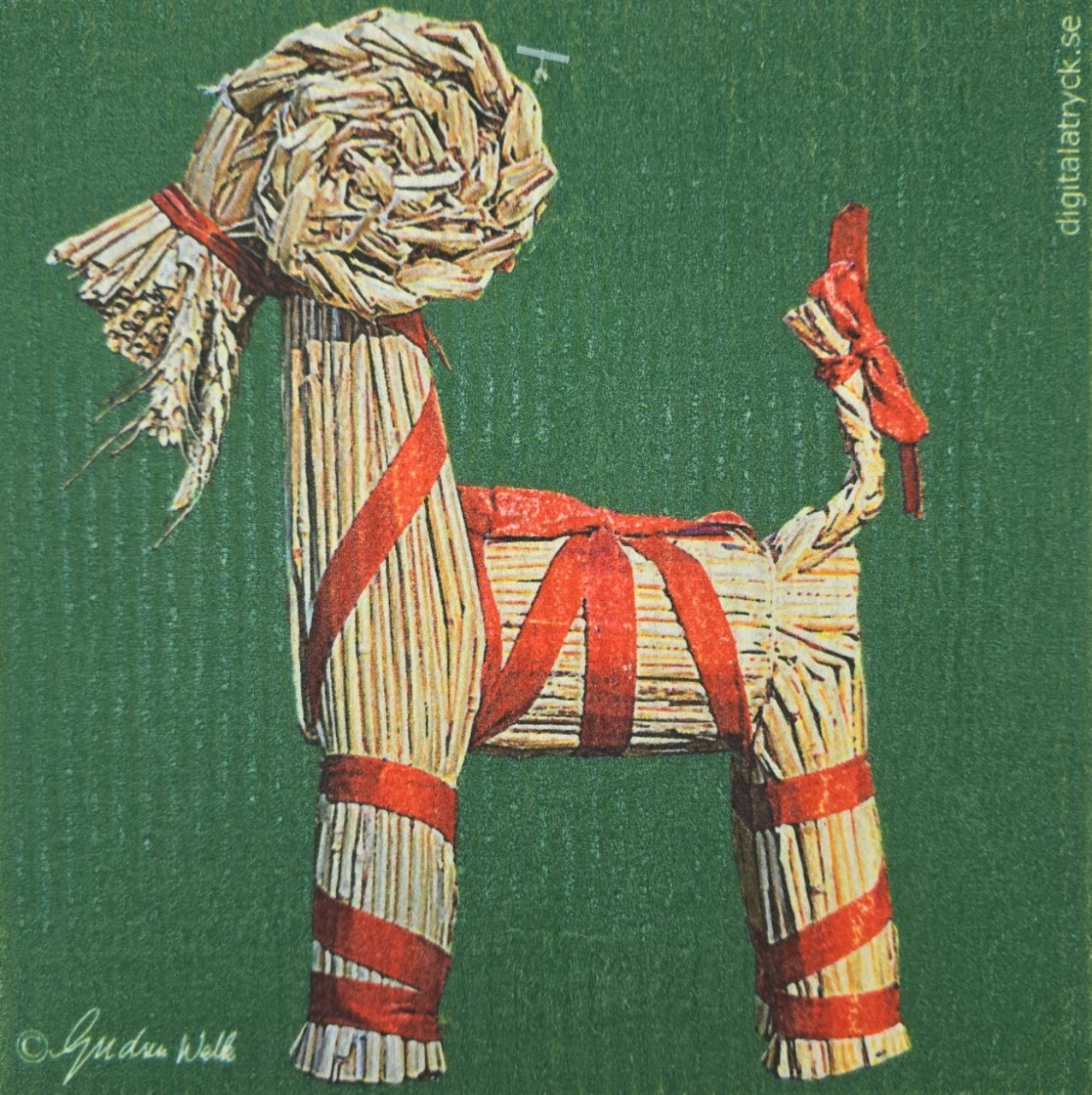 The Dish Cloth: Straw Goat Green captures the charm of a straw goat decorated with red ribbons on a green background, seamlessly merging tradition with eco-friendly elegance.