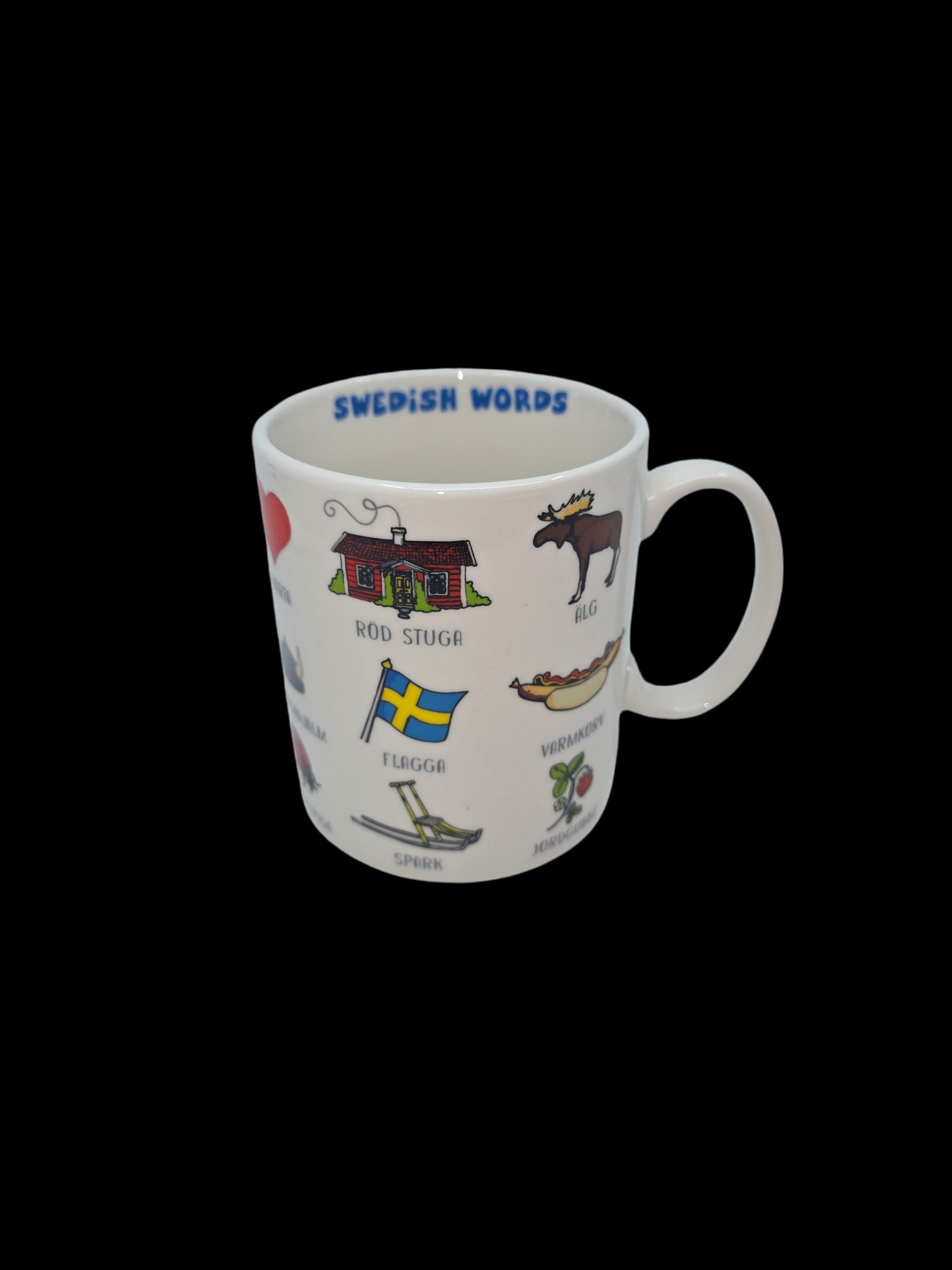 The "Mug: Swedish Words" features a sleek black background adorned with vibrant illustrations and Swedish vocabulary for items such as a house, moose, and flag. Imported from Sweden, this mug brings a delightful touch of Scandinavian charm to your collection.